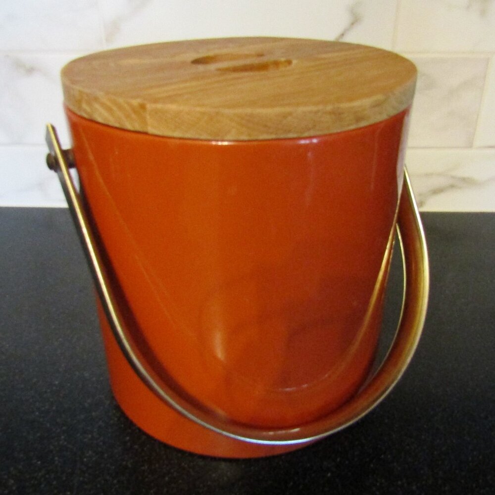 Vintage MCM burnt orange ice bucket with wood lid and brass handle